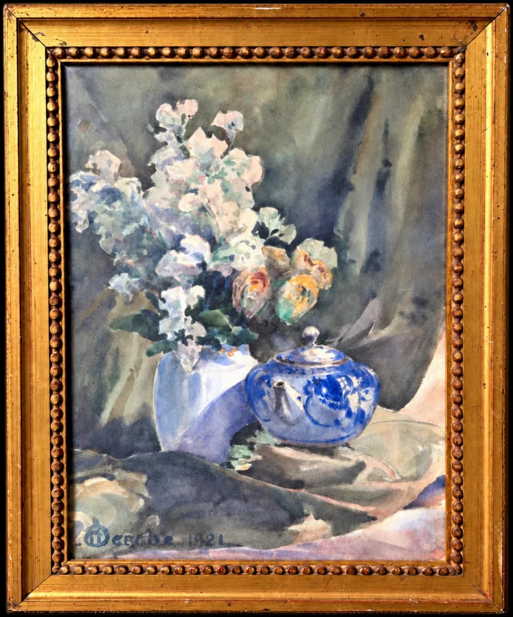 Pale flowers and two blue porcelain vessels in a gilt frame